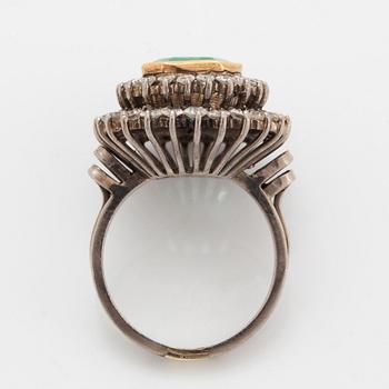 Emerald-cut emerald and eight-cut diamond ring.