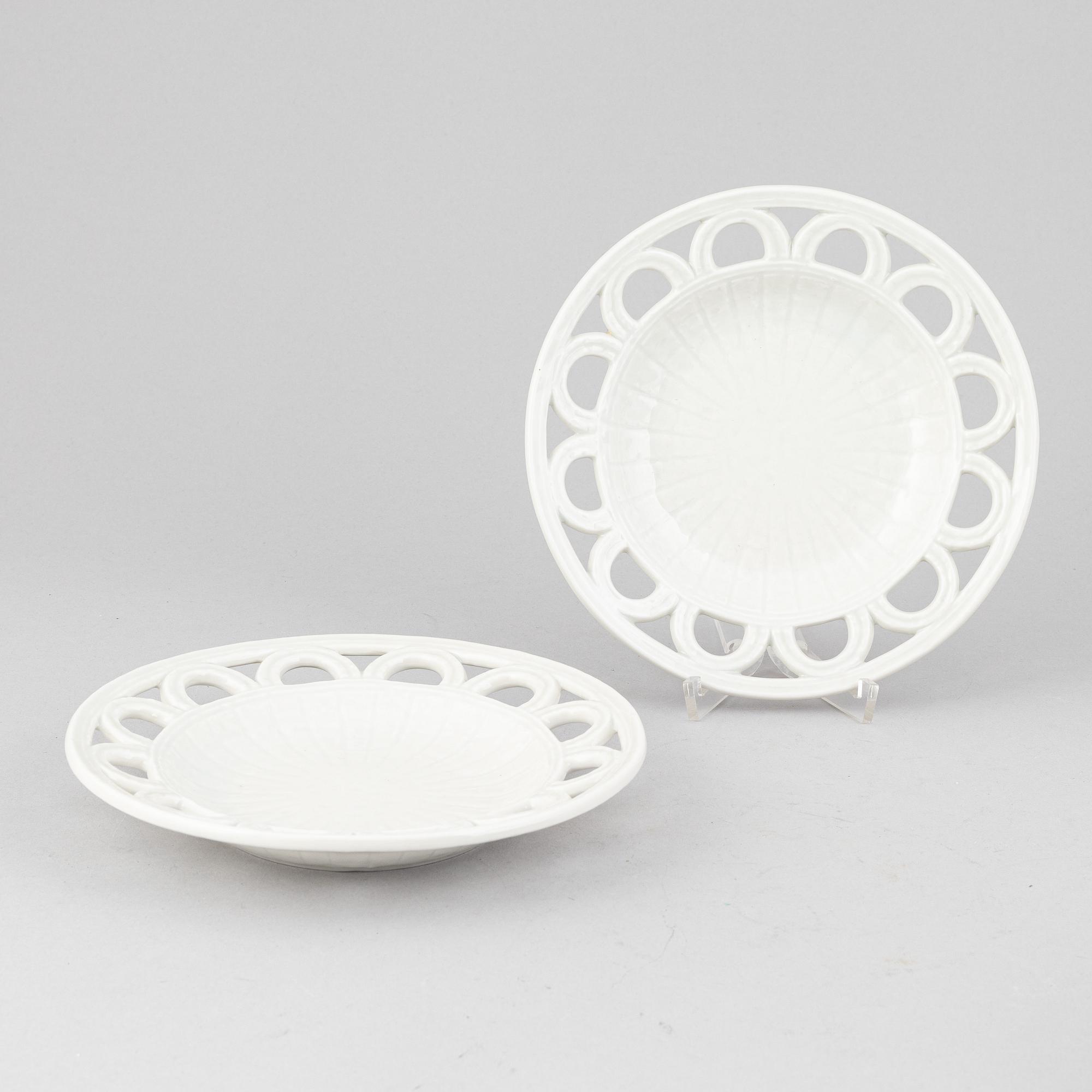 Gunnar Nylund, a set of 14 stoneware pot and plates and a vase/candle holder, Rörstrand.