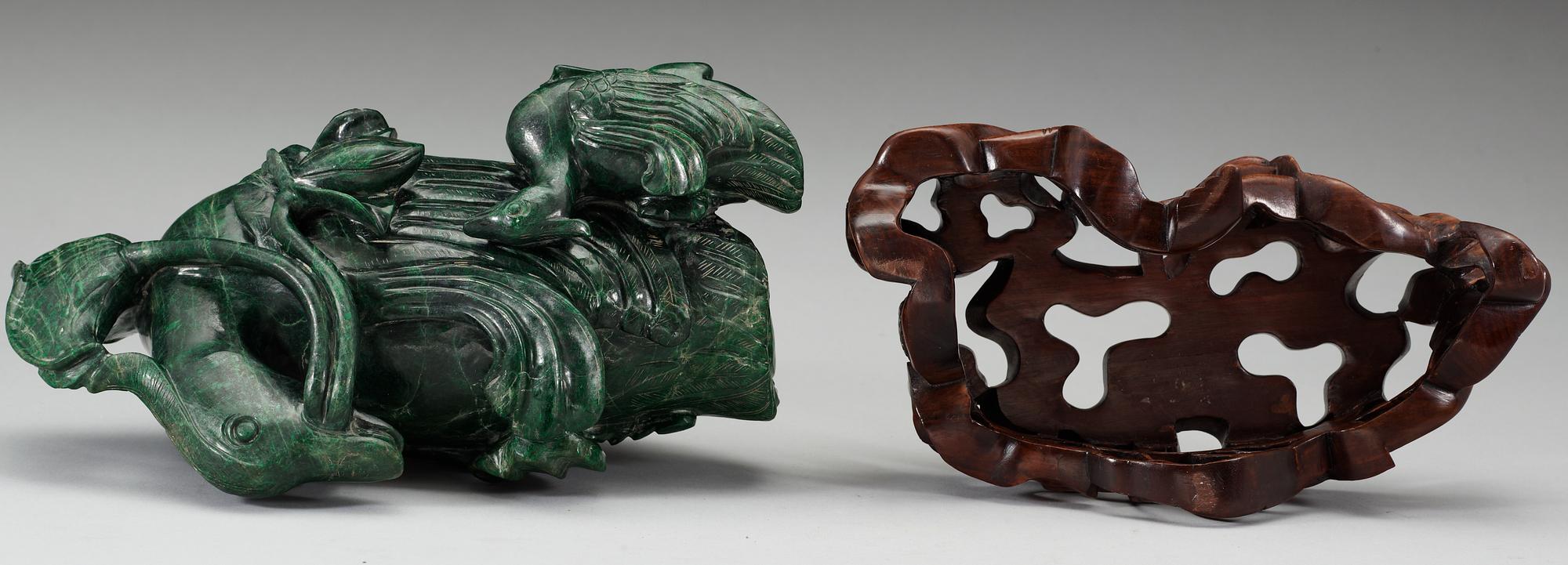 A green stone sculpture of two ducks, presumably late Qing dynasty.
