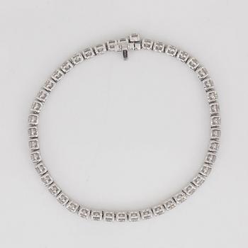 A brilliant-cut diamond bracelet. Quality circa H/VS, total gem-weight 11.42 cts accordning to engraving.