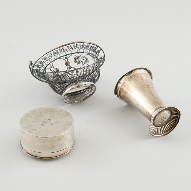 A silver box, a beaker and a basket, partly Sweden, 19th century.
