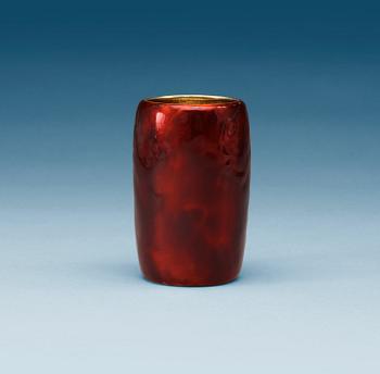 743. A C.G. Hallberg red enameled silver vase, Stockholm 1912.