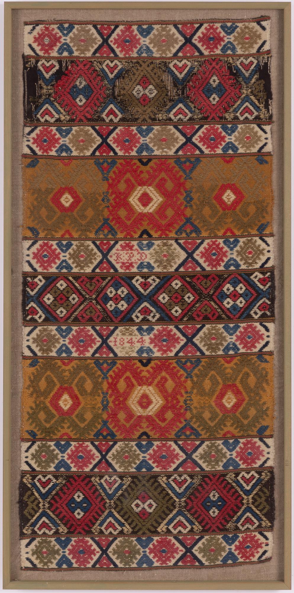 Vävnad, allmoge, daterad 1844, ca 107 x 49 cm.