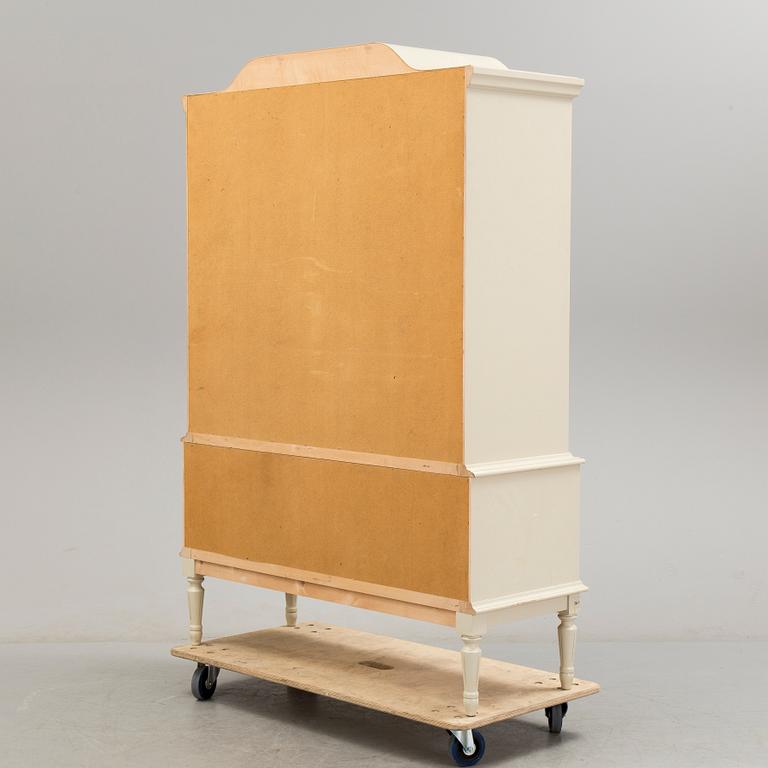 A gustavian style cabinet, last quarter of the 20th century.