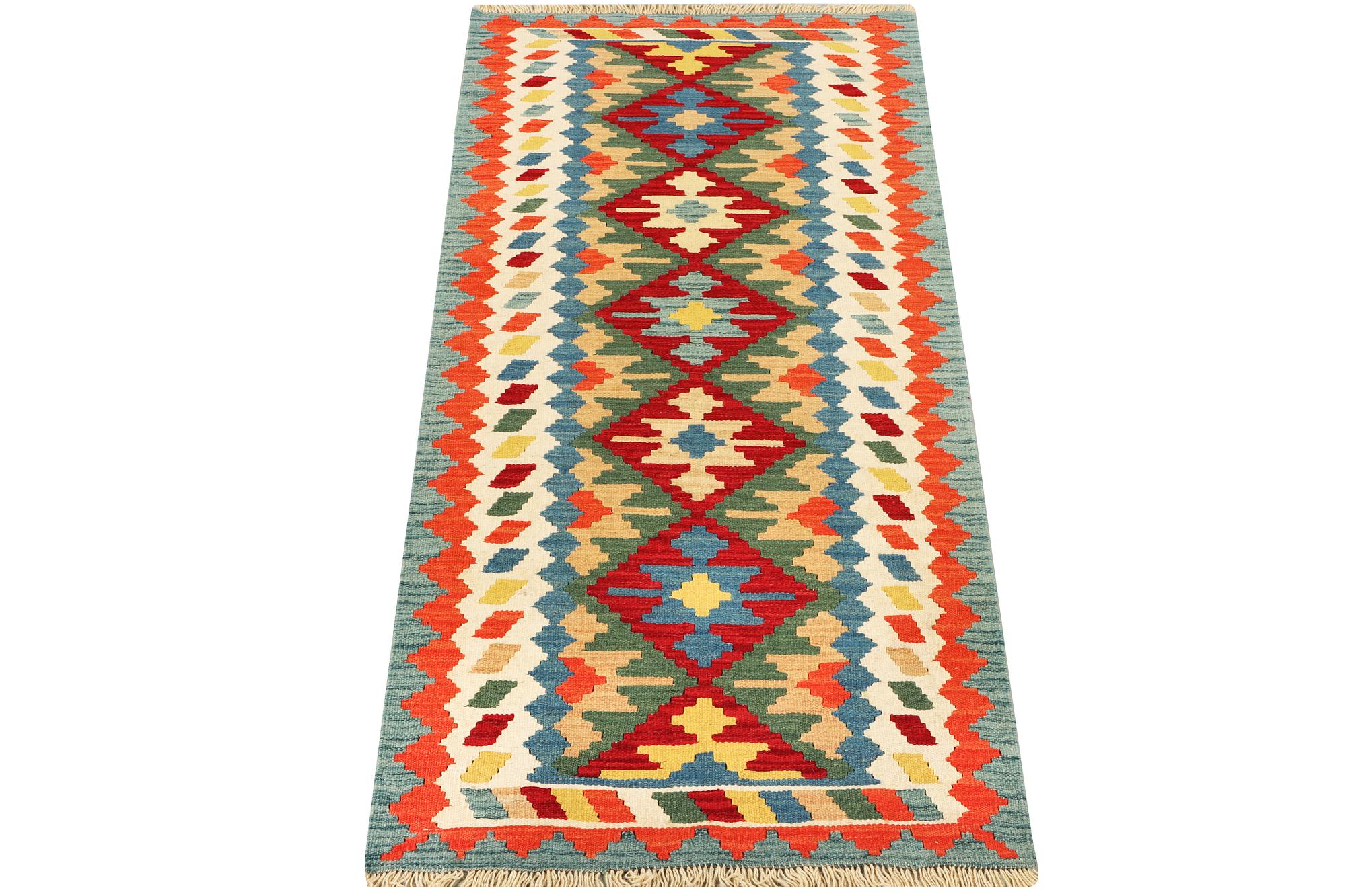 An Afghan kilim runner, c. 200 x 80 cm.