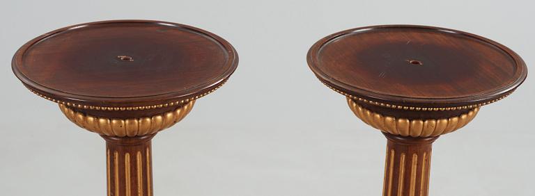 A pair of Empire 19th century candle stands.