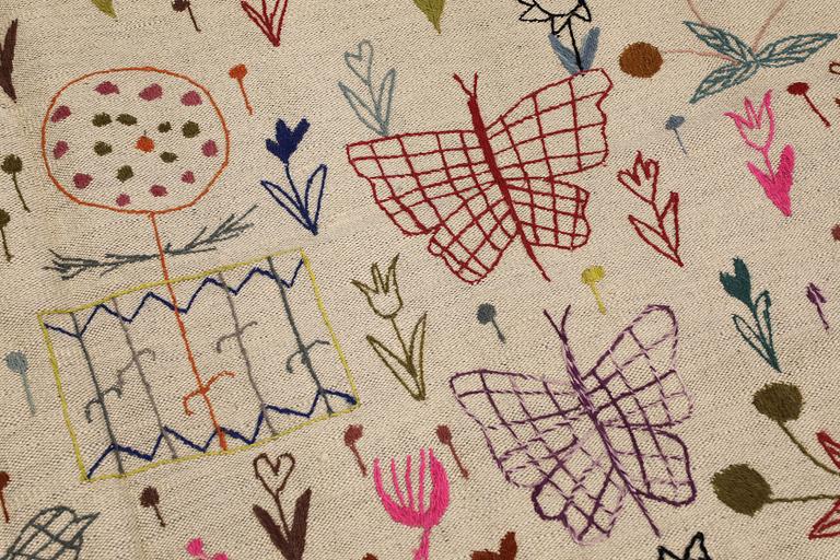 A Kelim rug, hand-embroidered, 241 x 179 cm.