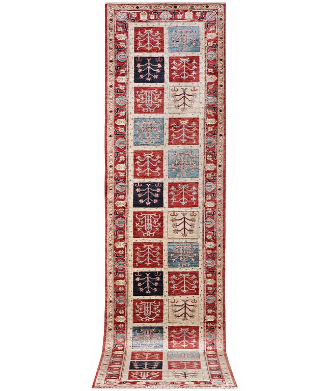 A runner carpet, Ziegler, c. 395 x 89 cm.