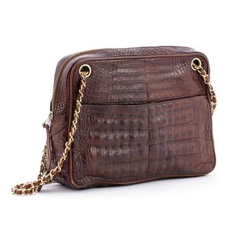 CHANEL, a brown crocodile shoulderbag from the 1980s.