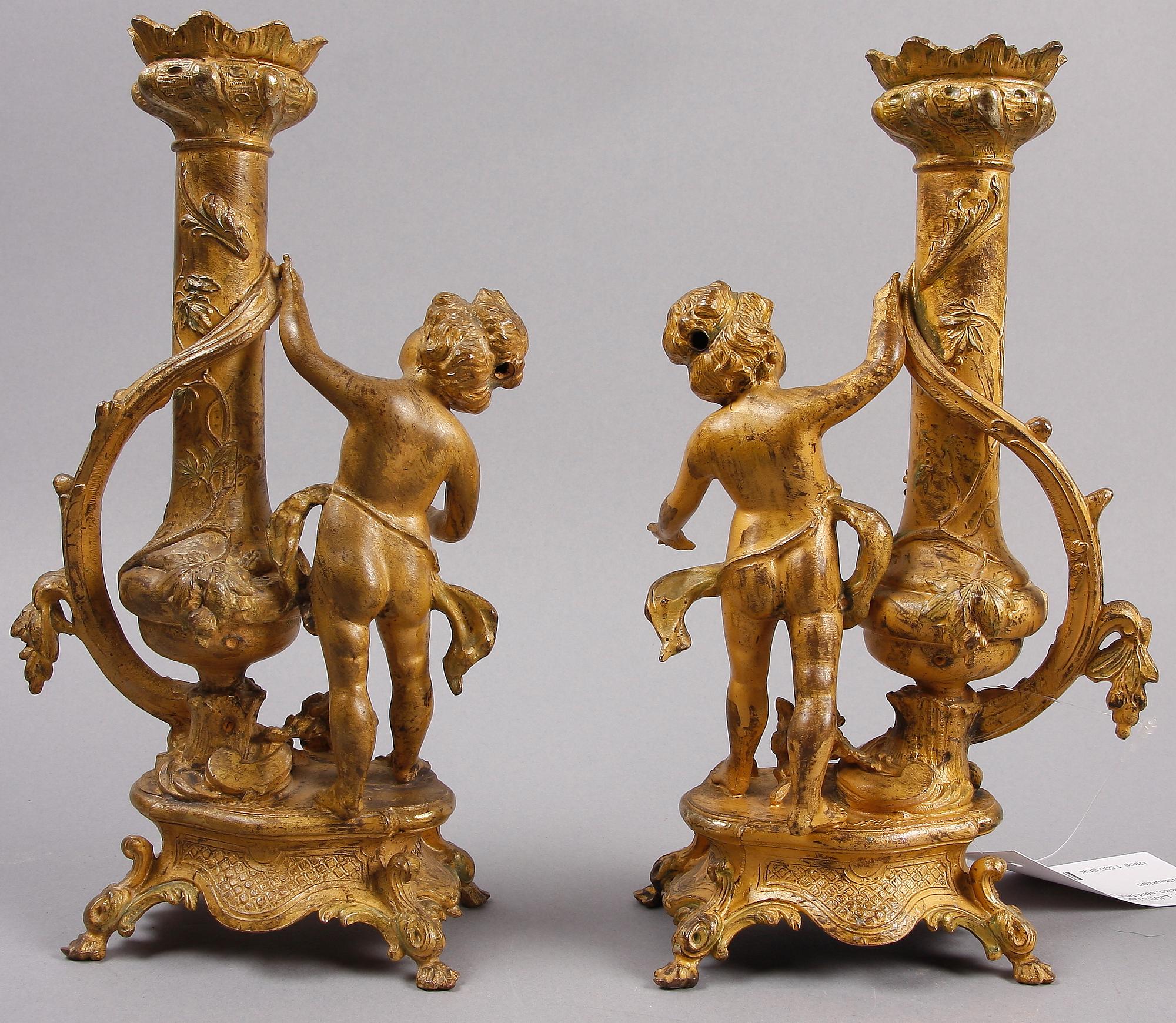 LJUSSTAKAR, ett par, metall, nyrokoko, sent 1800-tal.