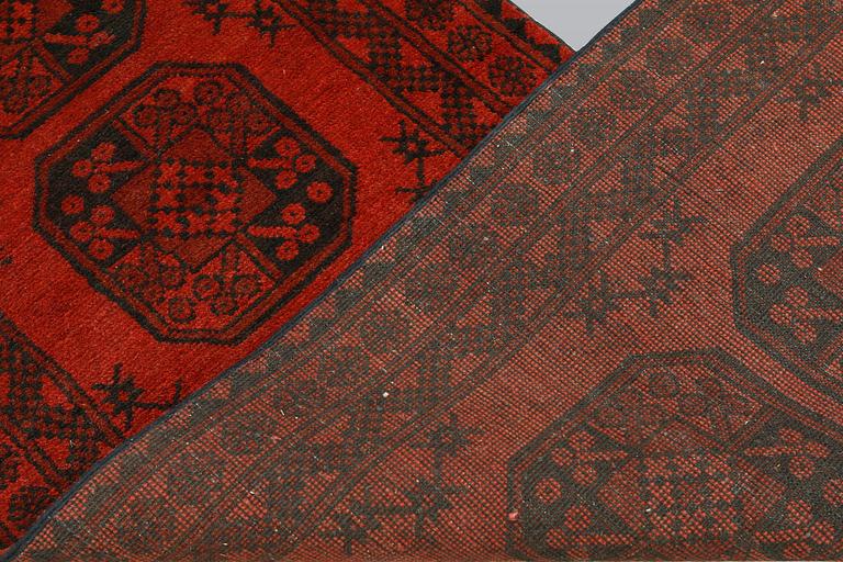 AnAfghan runner, ca 575 x 78 cm.