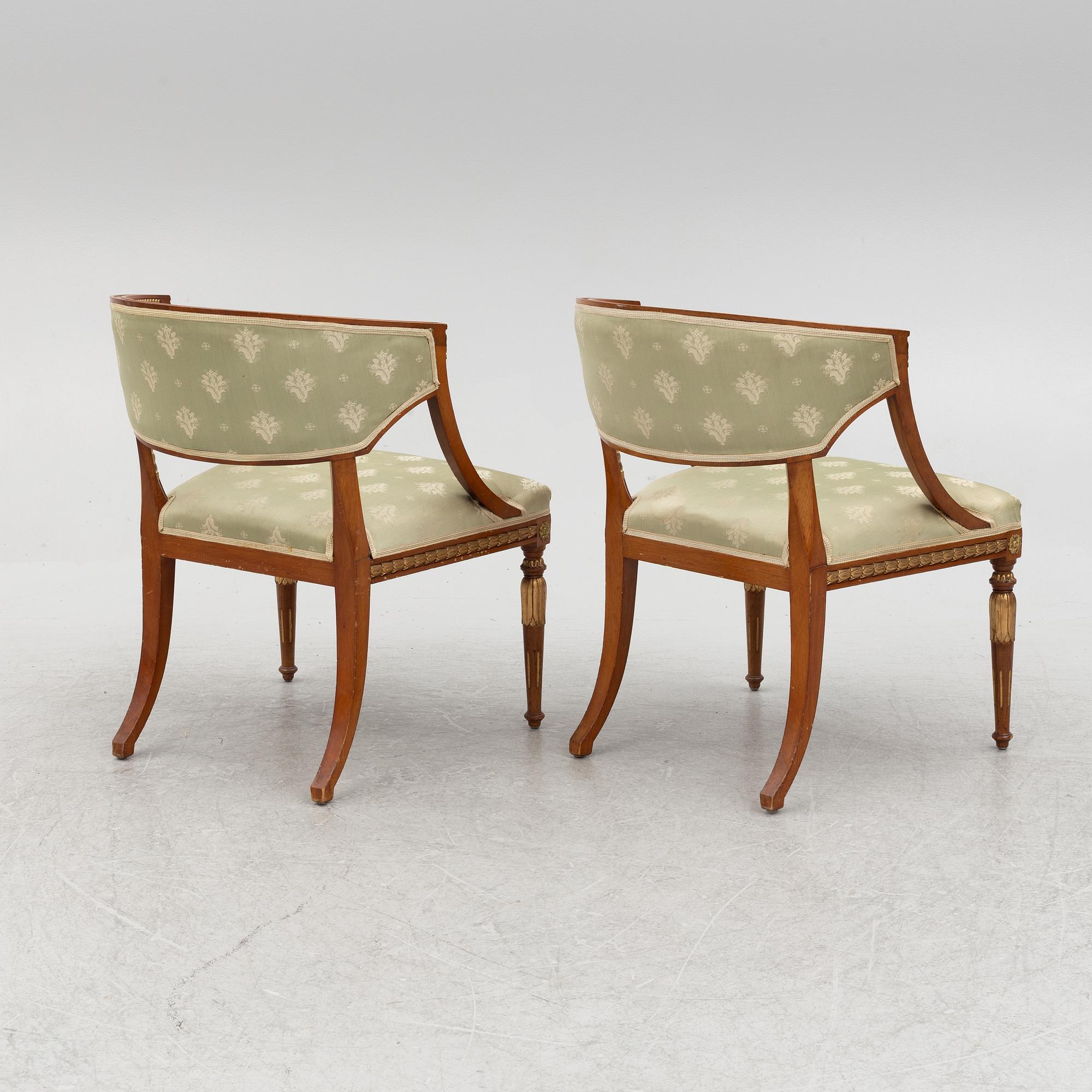 A pair of chairs, first half of the 20th century. Empire style.