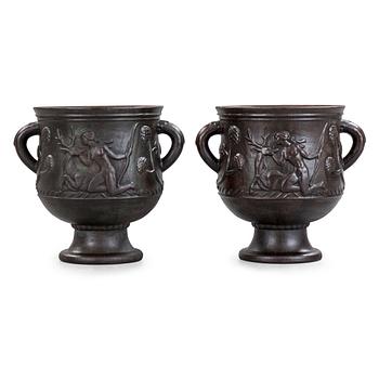 482. Ivar Johnsson, a pair of Swedish Grace cast iron jardinières, 'Diana' by Näfveqvarn, Sweden 1920's.