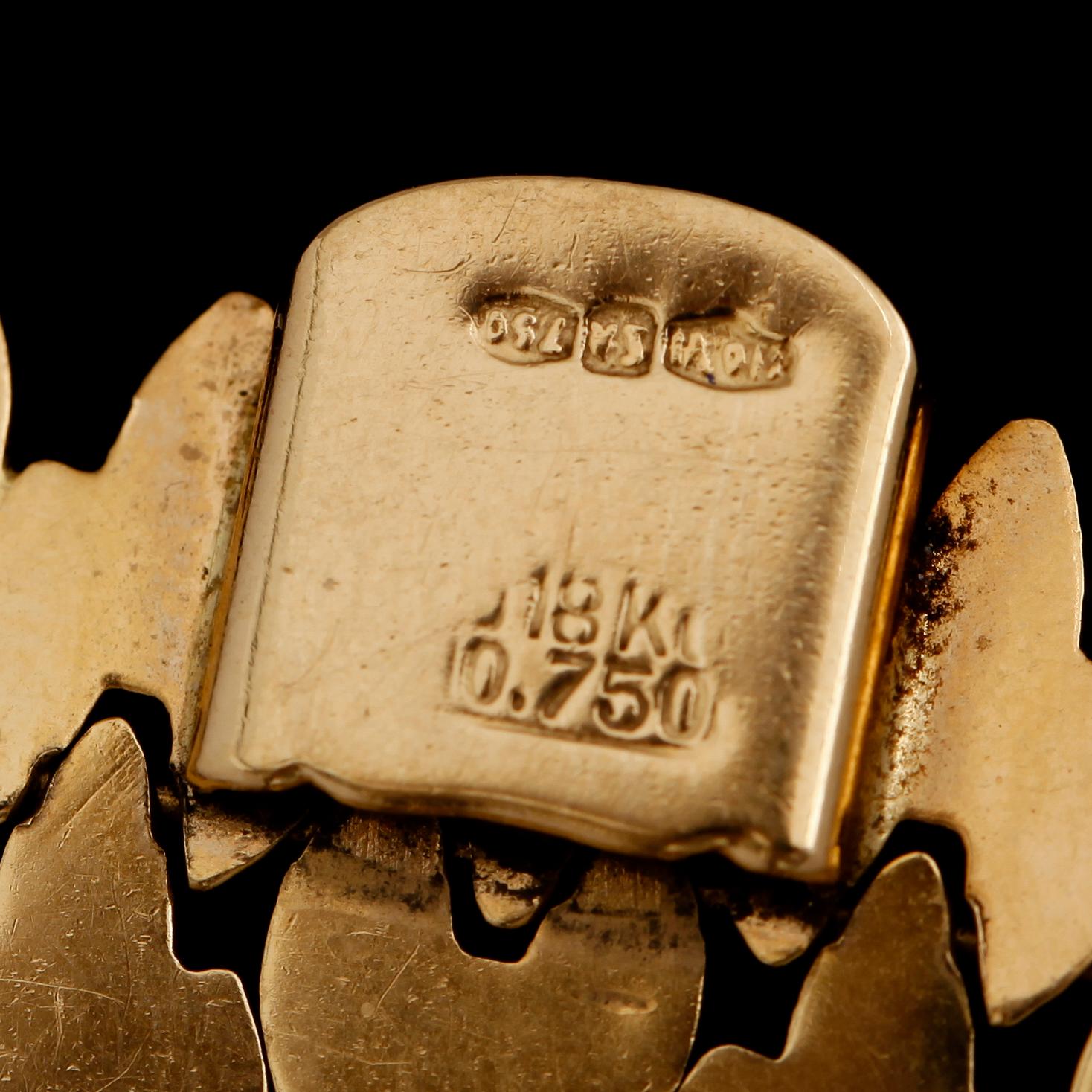 ARMBAND, 18 k guld, fantasilänk, vikt ca 55 g.