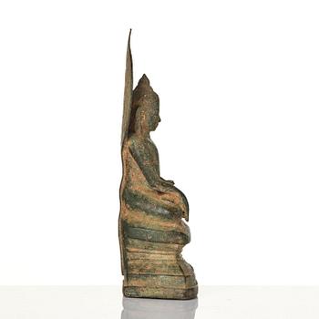 A bronze figure of Buddha with a halo, Burma, 16th century.