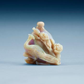1362. A carved snuff bottle, presumably opal.