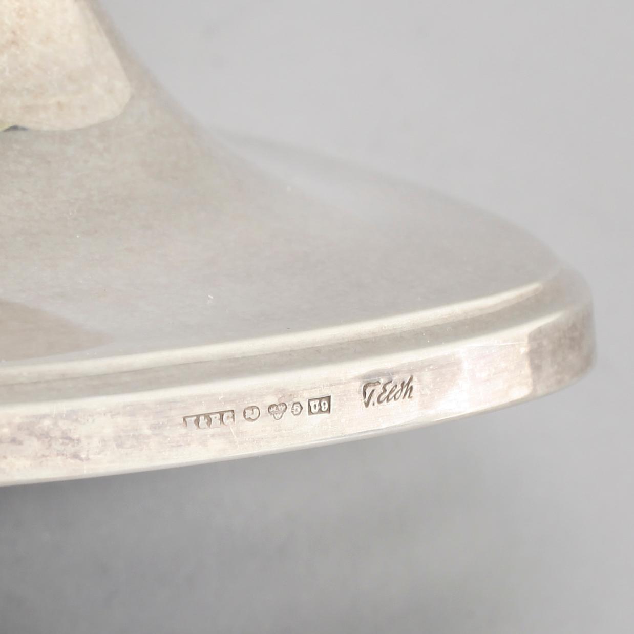 A pair of silver candlesticjs by Tore Eldh for K&EC in Gotheburg, 1970.