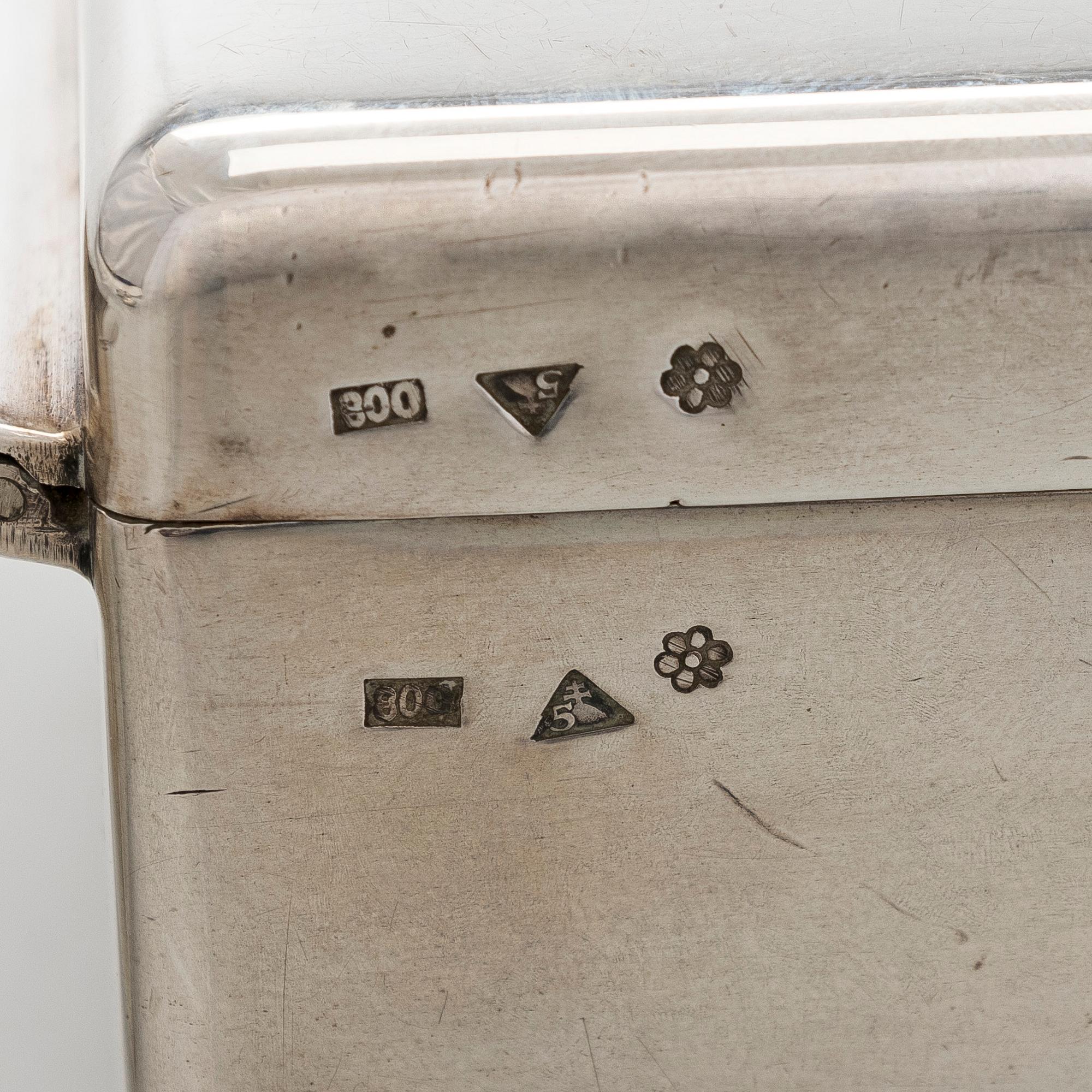 A silver cigarette case, matchbox holder and small bowl, Sandrik, as well as 3 ashtrays, Czechoslovakia 1929-1945.