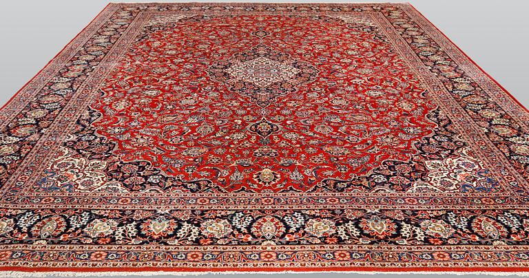 Carpet, Keshan, semi-antique, signed, 439 x 316 cm.