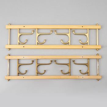 A pair of 'Dekorativ' coat hangers, Skoglunds metallgjuteri, Anderstorp, 1950's/60's.