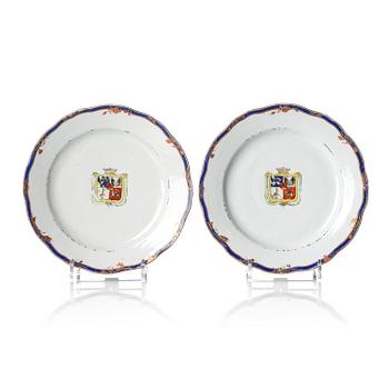 1123. A pair of 'Chinese Export' armorial dinner plates, Qing dynasty, 1790's.