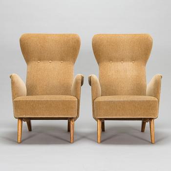 Carl Gustaf Hiort af Ornäs, a mid 1900's pair of armchairs for Hiort Tuote Puunveisto, Finland.
