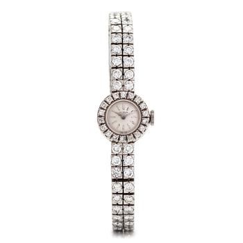 A platinum/18K white gold wristwatch, with brilliant and 16/16 cut diamonds totalling approximately 7.10 ct.