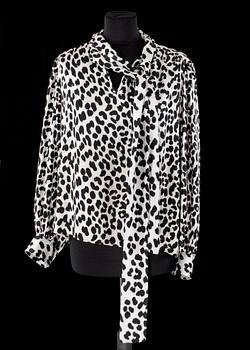 378. A set of two silk blouses by Yves Saint Laurent.