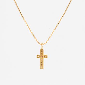 Efva Attling, 18K gold and brilliant-cut diamond cross pendant.