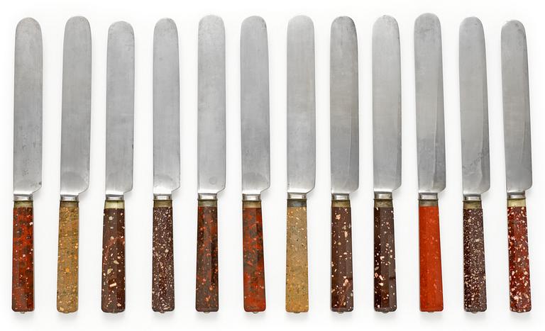 Twelve Swedish 19th century porphyry knives.