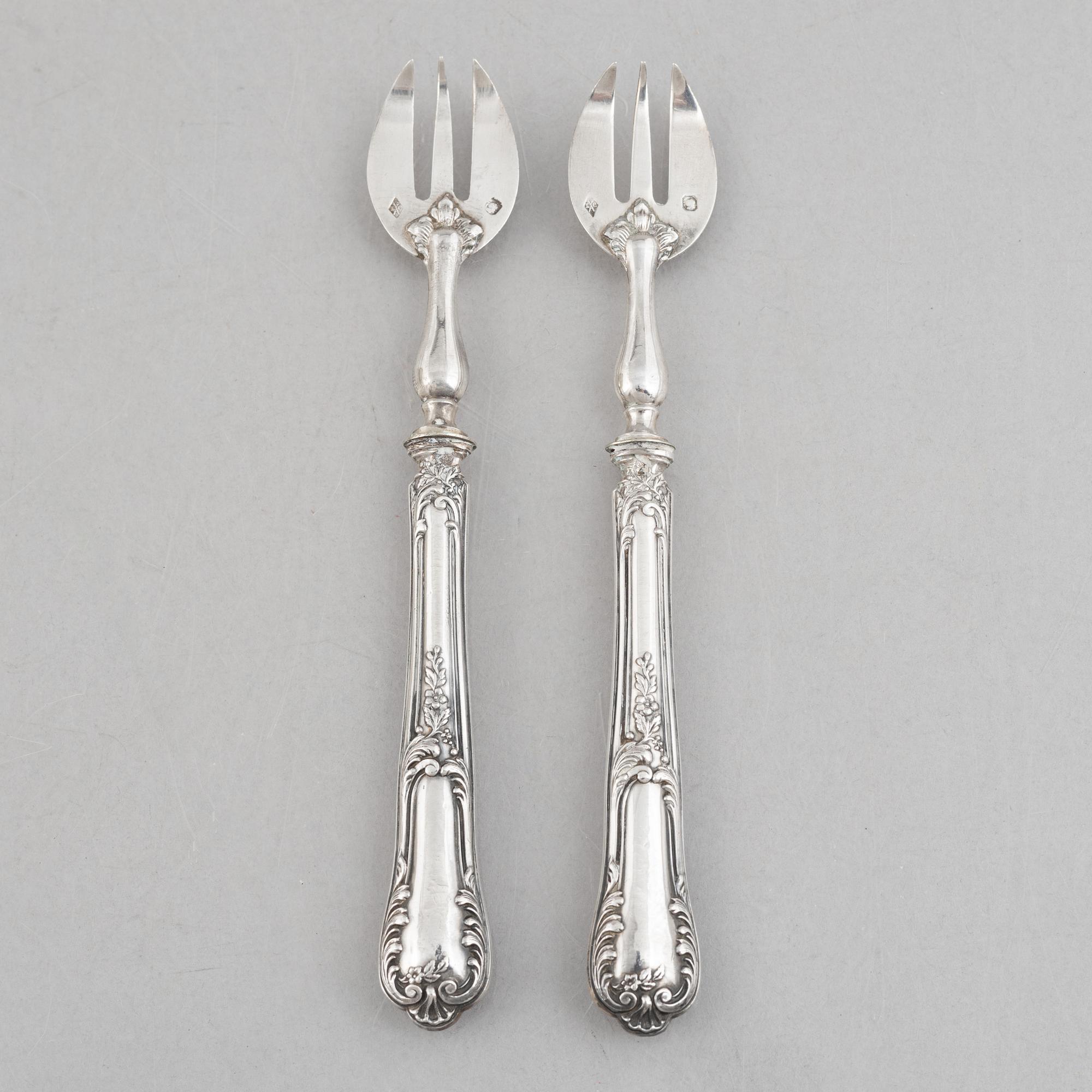 A set of twelve French silver oyster forks, mark of Louis Coignet