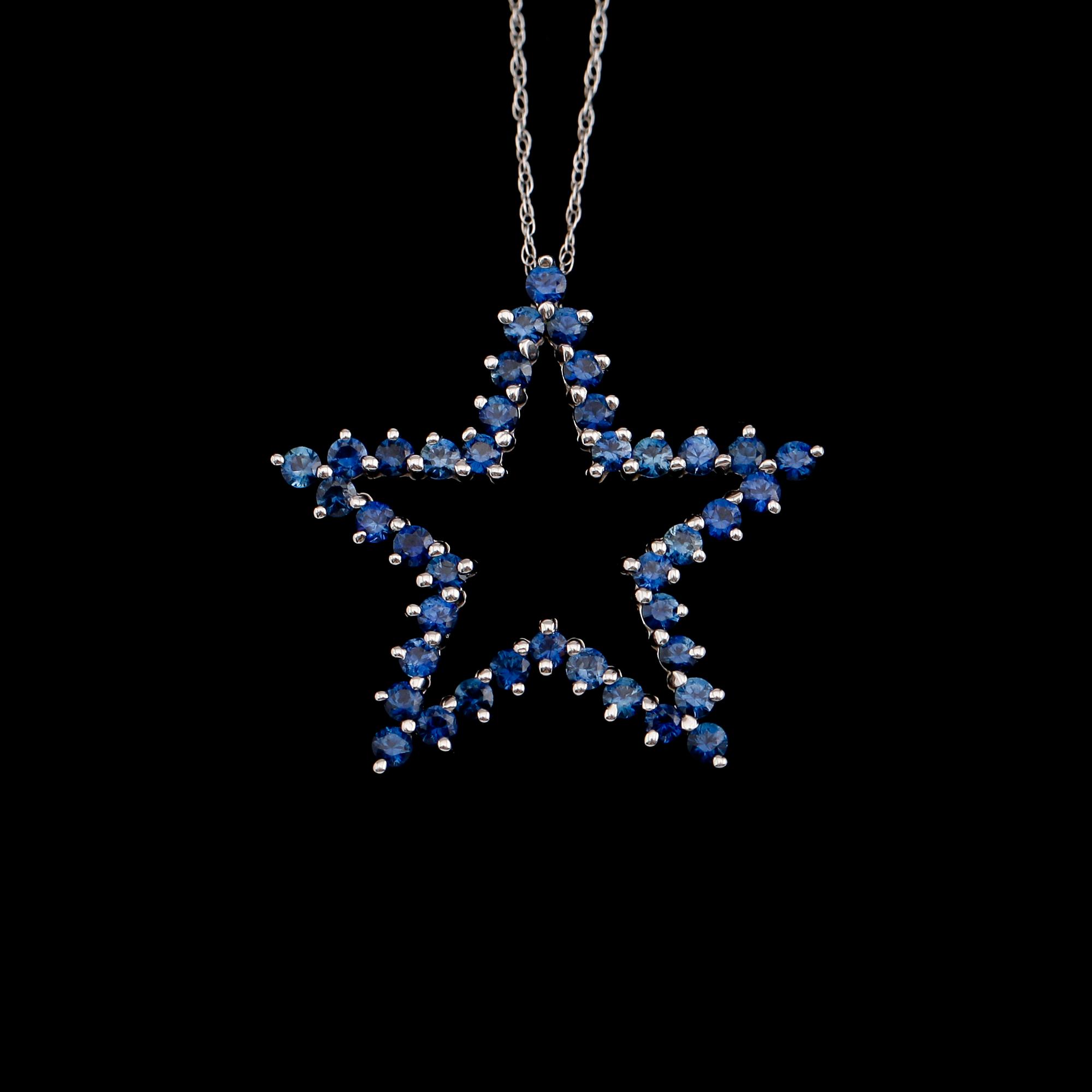 HÄNGE MED KEDJA, 14 k vitguld, safirer tot ca 1.25 ct.