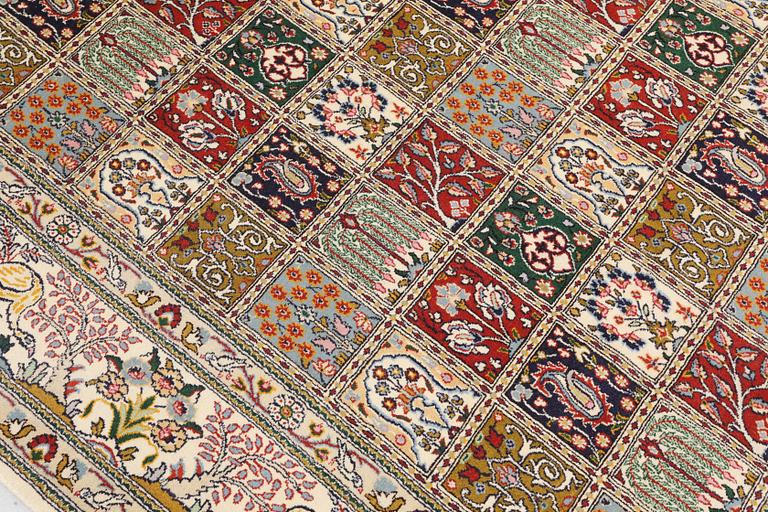 A part silk Moud rug, approx. 250 x 199 cm.
