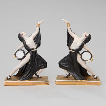 A pair of art déco porcelain figurines, Jean Born / Robj, Paris 1920s.