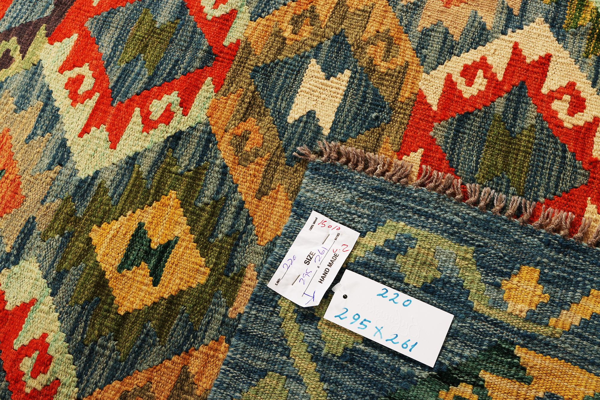 A Kilim carpet, c. 295 x 261 cm.