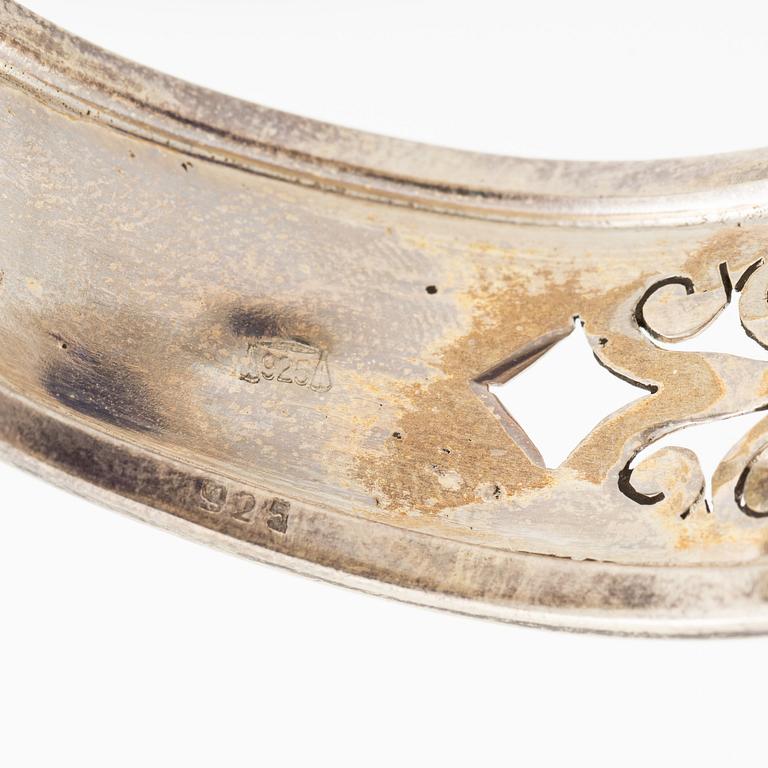 Arm ring, silver with drop-cut amethyst.