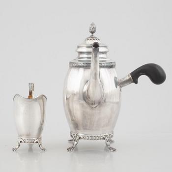 Carl Fredrik Carlman Company, a Gustavian style silver coffee pot and creamer, Stockholm, Sweden, 1915.