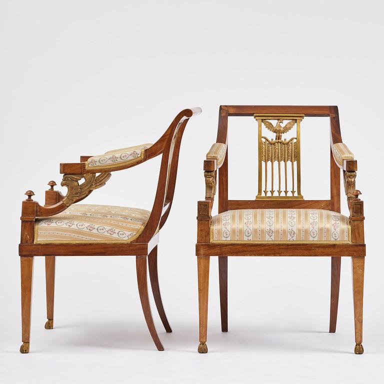 A pair of presumably Baltic empire mahogny armchairs.