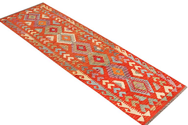 A runner carpet, Kilim, ca 304 x 84 cm.