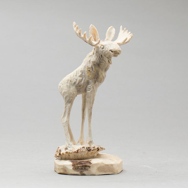 ERIK NORBERG, skulptur, monogramsignerad, skulpterat horn.