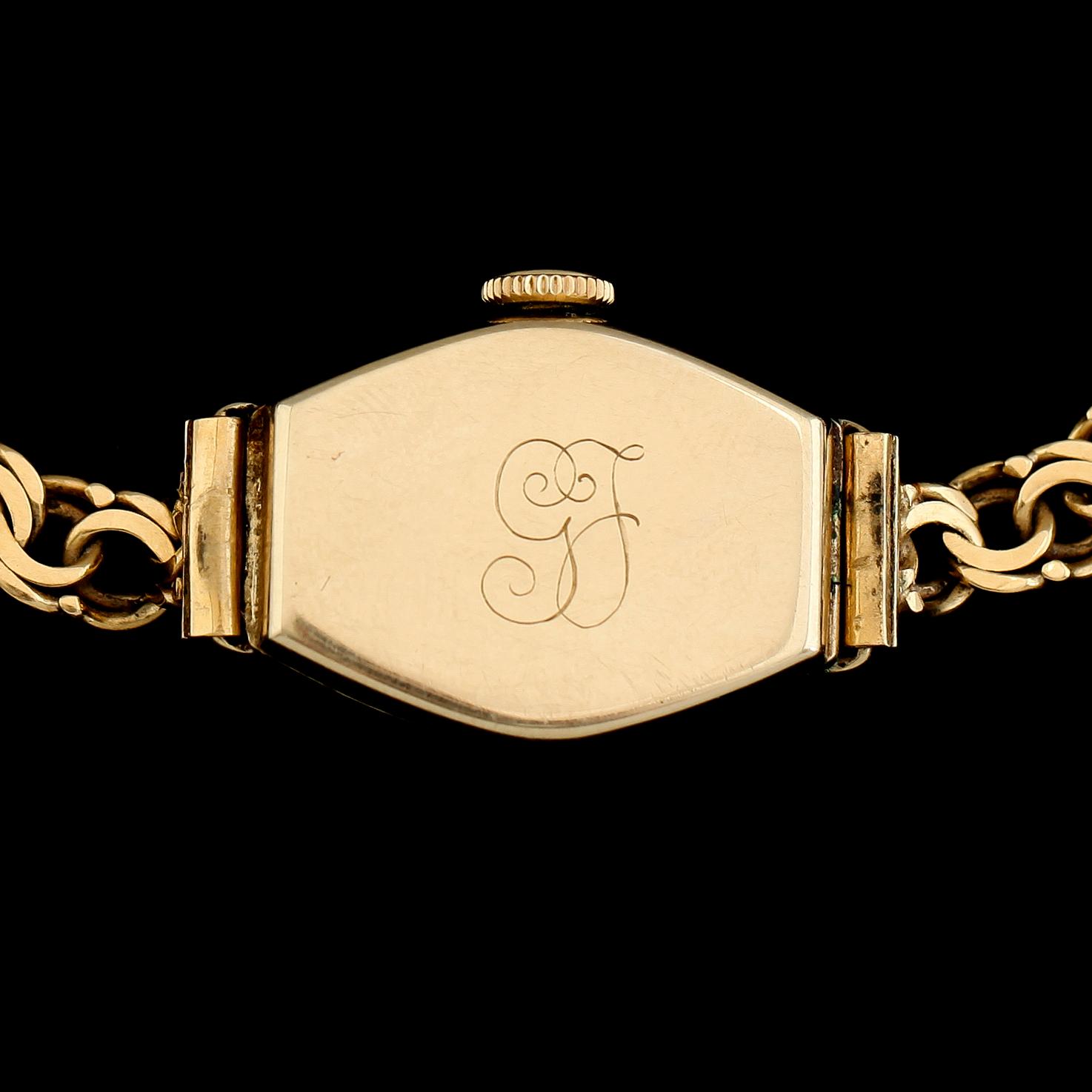 ARMBANDSUR, 14/18K guld, Boliden, Record, 1946. Total vikt inklusive urhus ca 15 g.