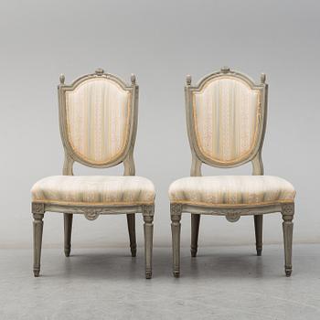 A pair of painted Gustavian chairs, end of the 18th century.