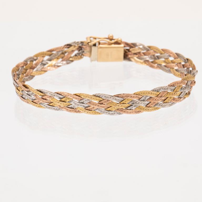 A 14K gold bracelet.