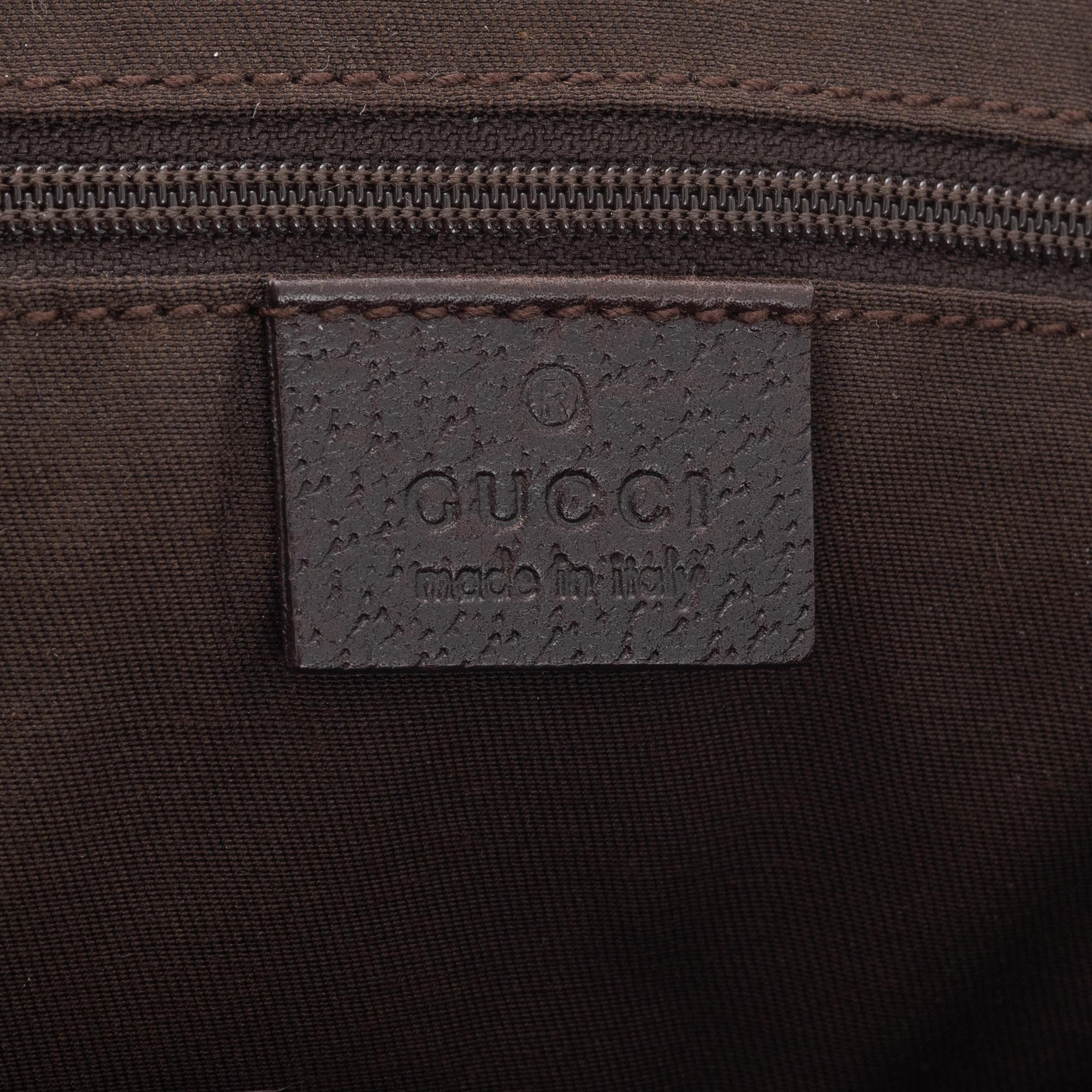 Gucci, a monogram canvas handbag.