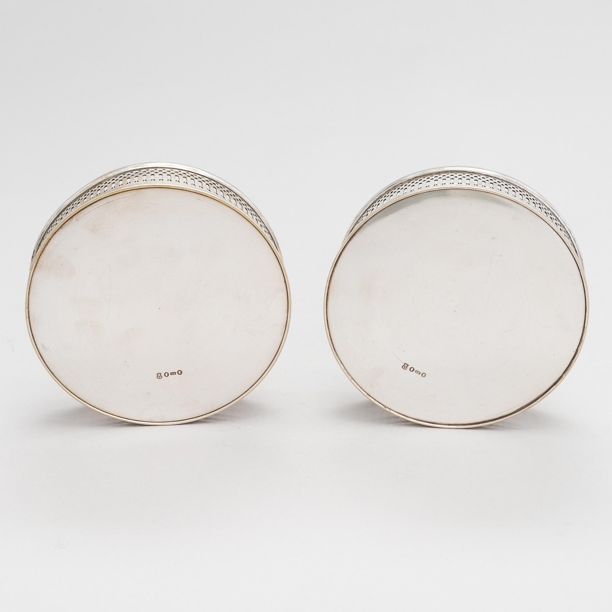 A pair of Russian silver-plated wine coasters, maker's mark of Aleksandr Katch, late 19th century.
