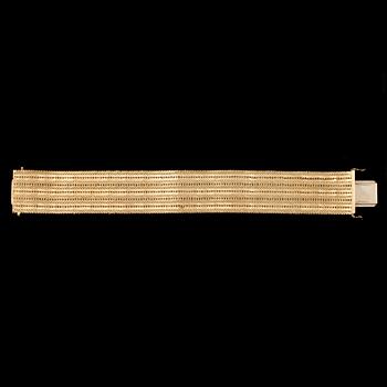 ARMBAND, guld 18K, Unoaerre, Italien, 1900-tal. Vikt ca 89 gram.