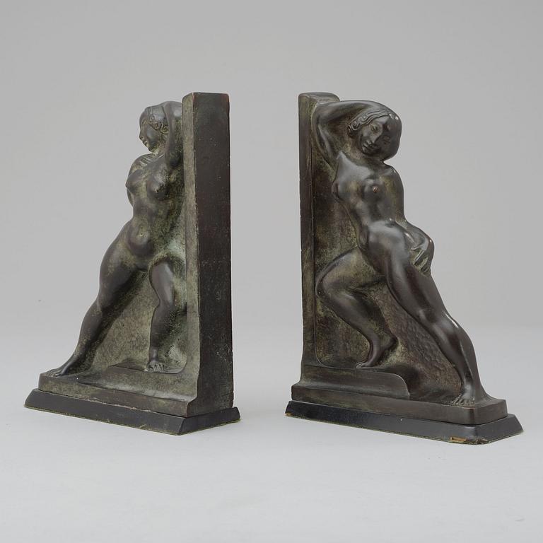 A pair of Axel Gute bronze book ends, 1922.