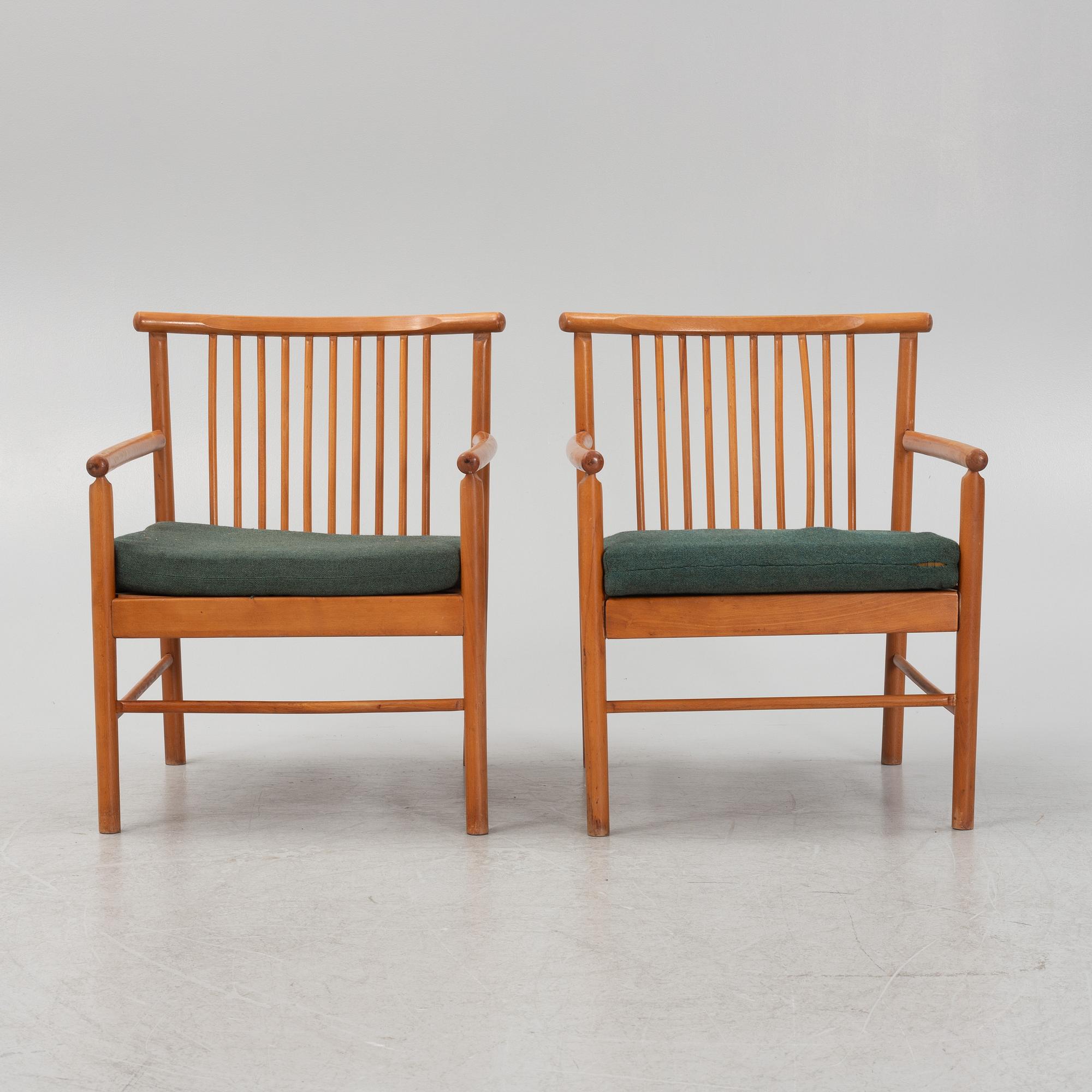 A pair of armchairs, mid 20th Century.