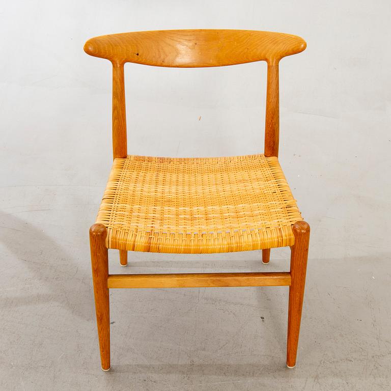 Four model 'W2' oak chairs by Hans Wegner for C.M. Madsen, Denmark, designed 1953.