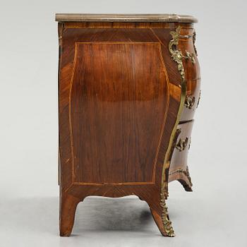 A rococo parquetry commode by C. G. Willkom (master in Stockholm 1763-65).